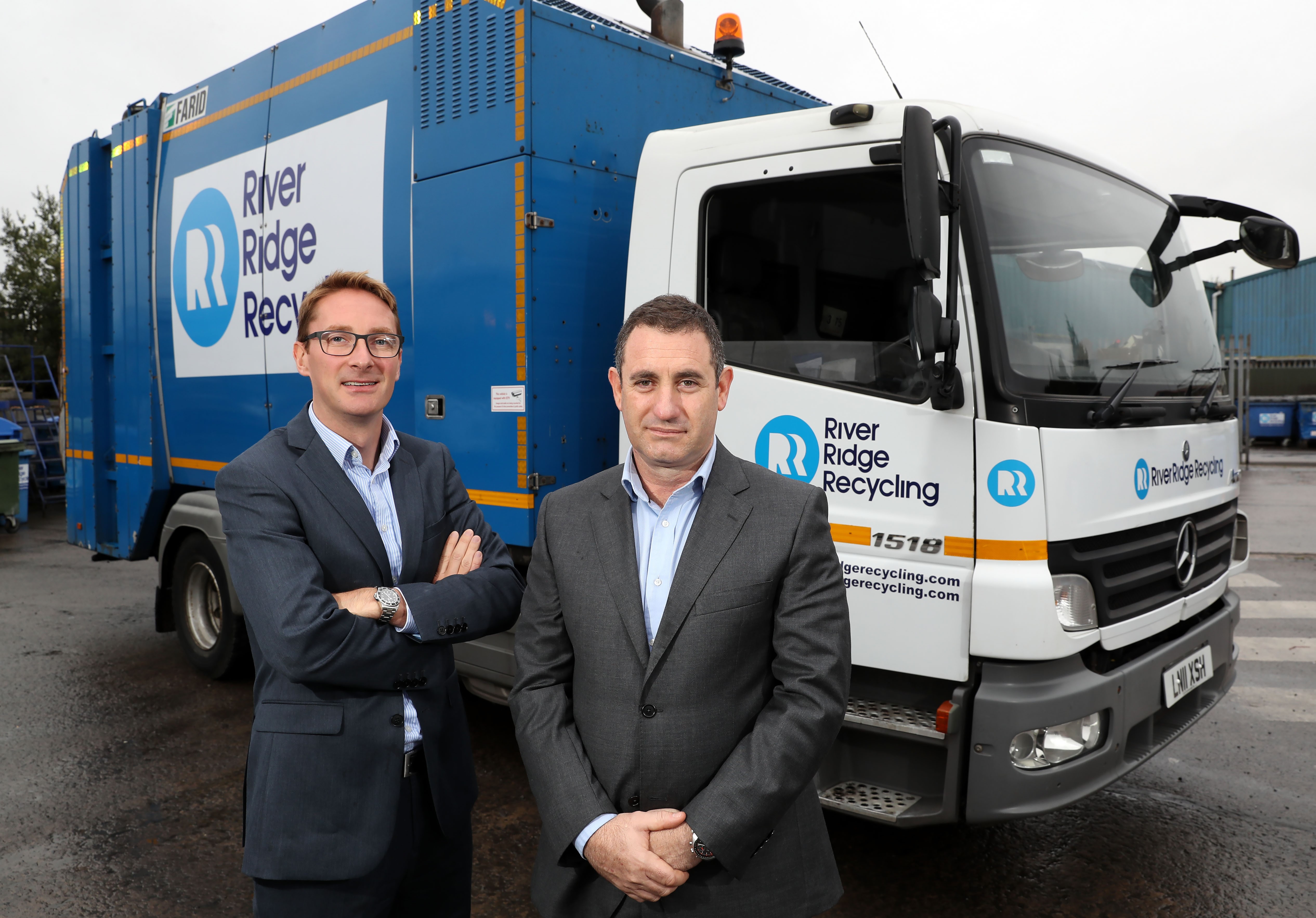 Paddy Graham from BGF and Brett Ross, founder and chief executive of RiverRidge at RiverRidge Recycling’s facility at Duncrue Road in Belfast. 